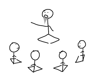 cross-legged stick figures facing elderly wise stick figure